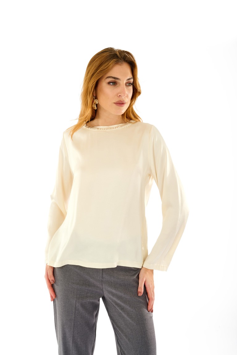 Blusa con passamaneria