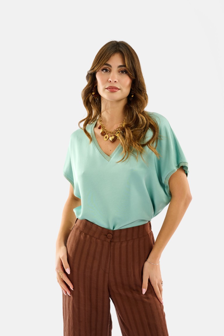 Blusa scollo V dettagli...