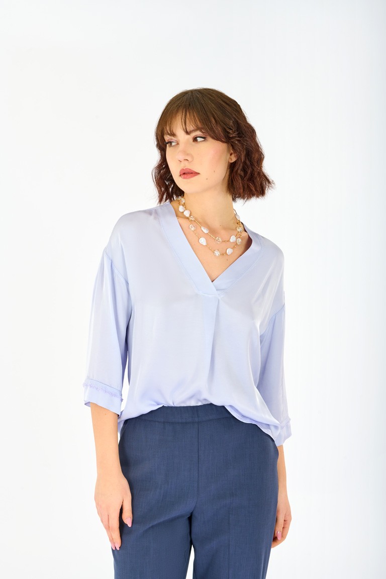 Blusa manica frangia