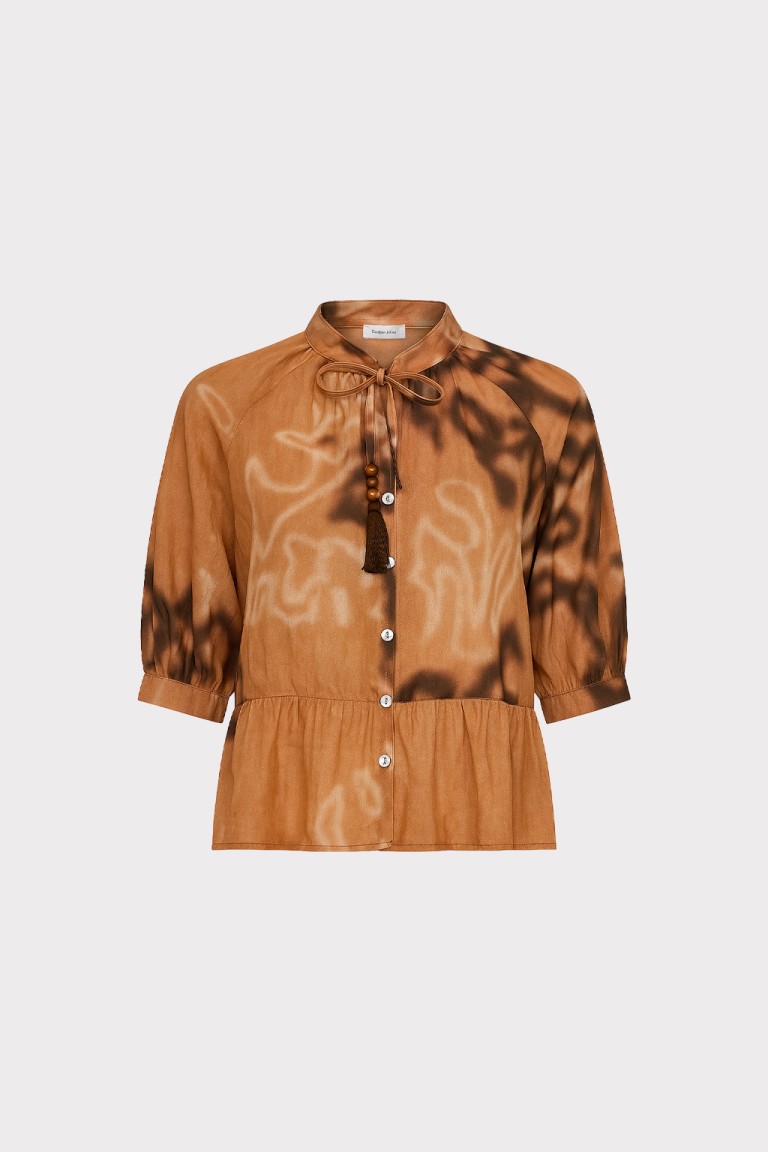 Blusa con laccio e nappine