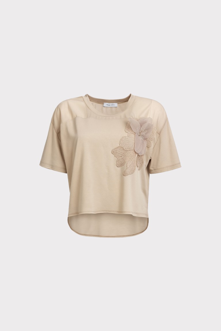Blusa dettaglio fiore e perle