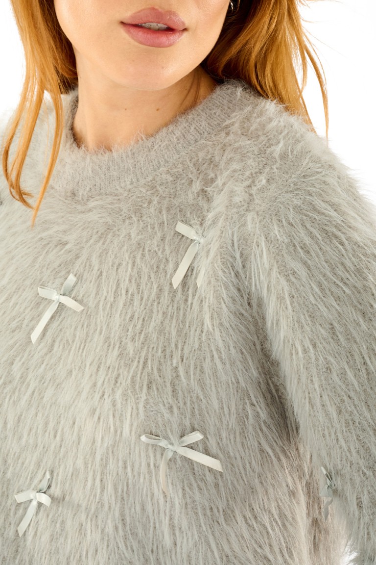 Maglione con fiocchi