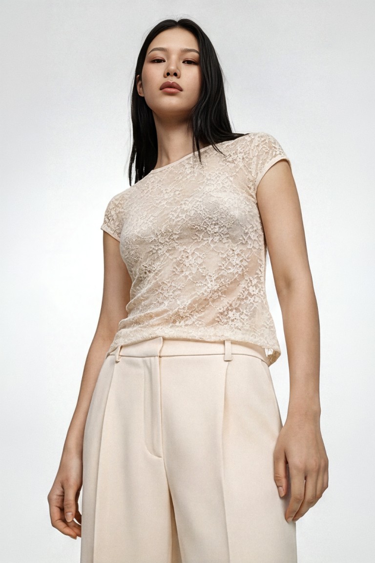 Top ricamo microrete