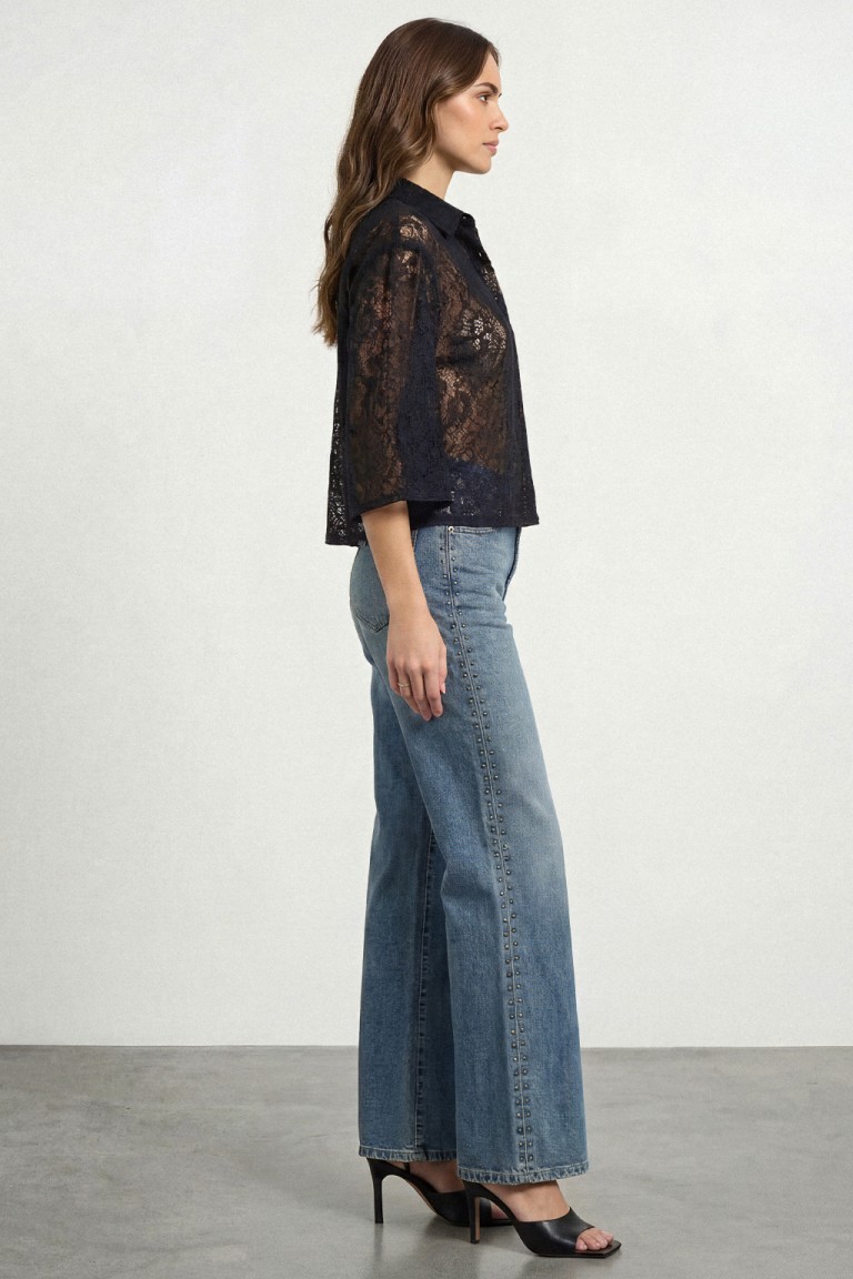 Jeans palazzo con borchie
