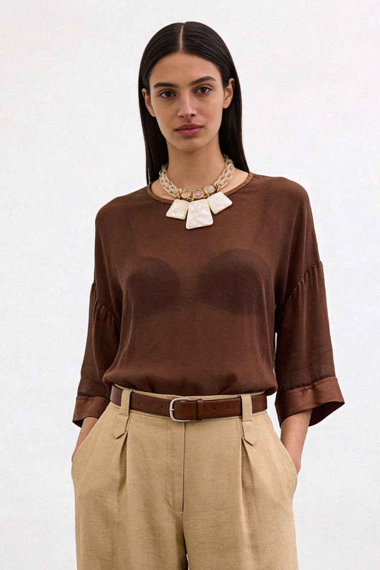 Blusa over semitrasparente