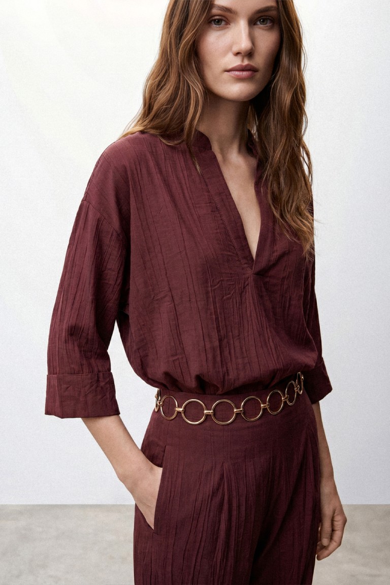 Blusa over con drappeggio