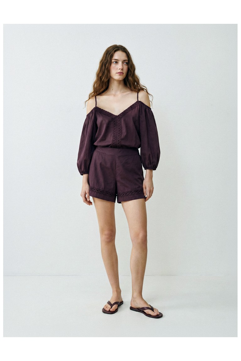 Shorts con passamaneria
