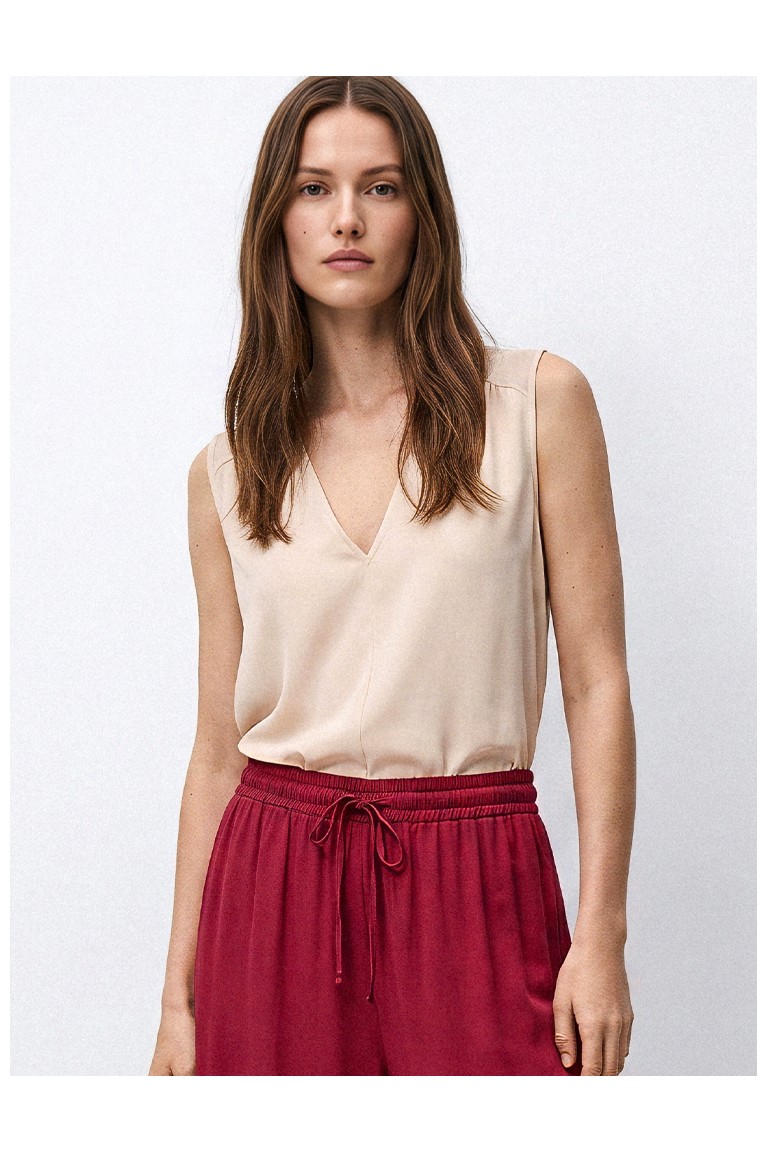 Top spalla larga scollo a V